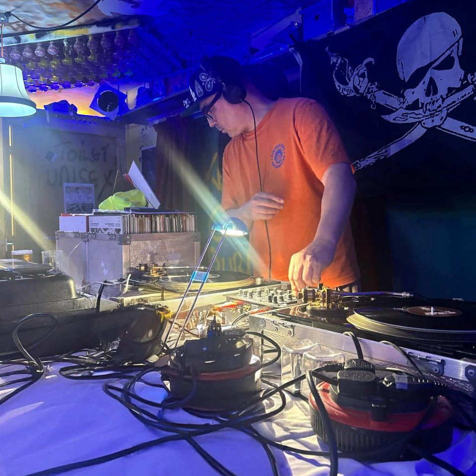 DJ Lowrider playing live behind the decks
